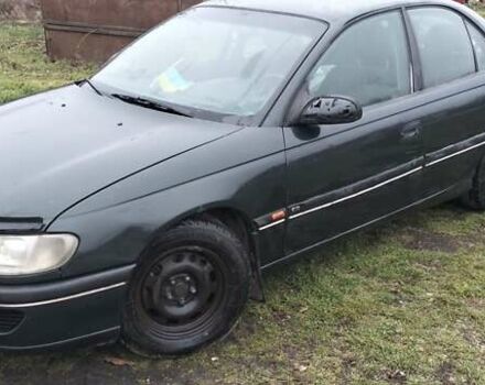 Зеленый Опель Омега, объемом двигателя 2 л и пробегом 328 тыс. км за 1600 $, фото 2 на Automoto.ua