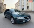 Зеленый Опель Омега, объемом двигателя 2.5 л и пробегом 250 тыс. км за 1950 $, фото 1 на Automoto.ua