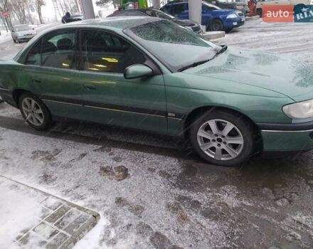 Зелений Опель Омега, об'ємом двигуна 2 л та пробігом 264 тис. км за 3498 $, фото 2 на Automoto.ua