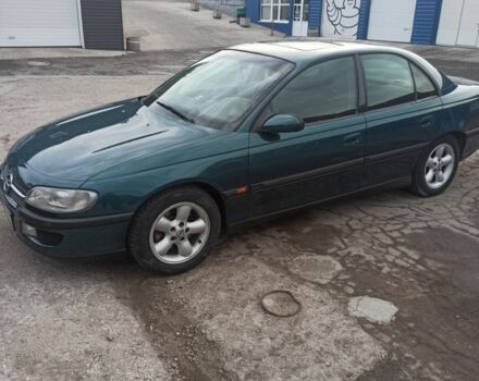 Зеленый Опель Омега, объемом двигателя 2.5 л и пробегом 300 тыс. км за 3000 $, фото 15 на Automoto.ua