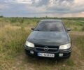 Зеленый Опель Омега, объемом двигателя 2 л и пробегом 240 тыс. км за 1500 $, фото 1 на Automoto.ua