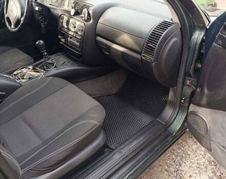 Зеленый Опель Омега, объемом двигателя 2 л и пробегом 320 тыс. км за 2600 $, фото 9 на Automoto.ua