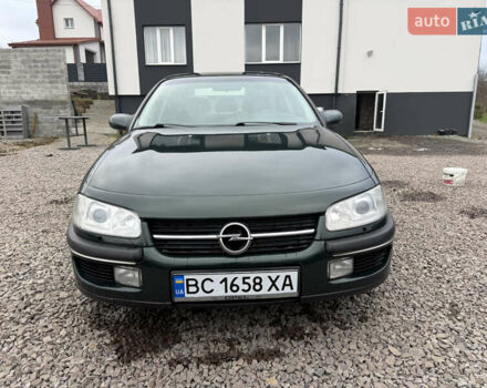Зелений Опель Омега, об'ємом двигуна 2 л та пробігом 397 тис. км за 2500 $, фото 6 на Automoto.ua