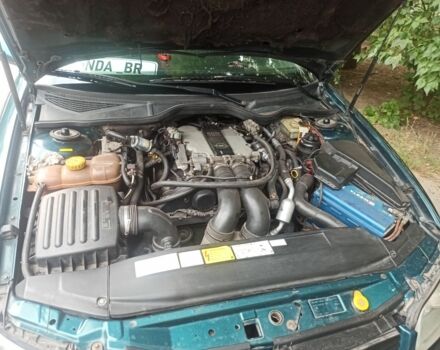 Зеленый Опель Омега, объемом двигателя 2.5 л и пробегом 300 тыс. км за 3000 $, фото 6 на Automoto.ua