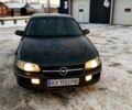 Зеленый Опель Омега, объемом двигателя 2.5 л и пробегом 260 тыс. км за 2450 $, фото 1 на Automoto.ua