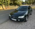 Зеленый Опель Омега, объемом двигателя 2 л и пробегом 300 тыс. км за 2500 $, фото 1 на Automoto.ua