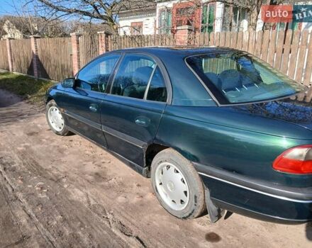 Зелений Опель Омега, об'ємом двигуна 2 л та пробігом 397 тис. км за 1000 $, фото 10 на Automoto.ua