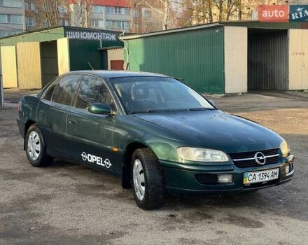 Зеленый Опель Омега, объемом двигателя 2 л и пробегом 320 тыс. км за 2600 $, фото 1 на Automoto.ua