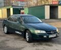 Зеленый Опель Омега, объемом двигателя 2 л и пробегом 320 тыс. км за 2600 $, фото 1 на Automoto.ua