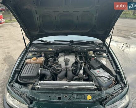 Зеленый Опель Омега, объемом двигателя 2.96 л и пробегом 345 тыс. км за 3000 $, фото 12 на Automoto.ua