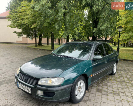 Зеленый Опель Омега, объемом двигателя 2 л и пробегом 300 тыс. км за 1750 $, фото 14 на Automoto.ua