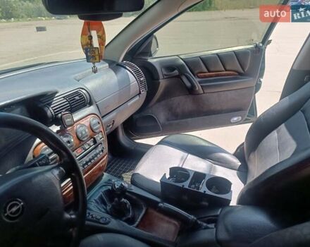 Зеленый Опель Омега, объемом двигателя 2 л и пробегом 85 тыс. км за 3800 $, фото 7 на Automoto.ua