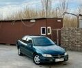 Зеленый Опель Омега, объемом двигателя 2 л и пробегом 331 тыс. км за 2400 $, фото 1 на Automoto.ua