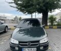 Зеленый Опель Омега, объемом двигателя 2 л и пробегом 406 тыс. км за 1594 $, фото 1 на Automoto.ua
