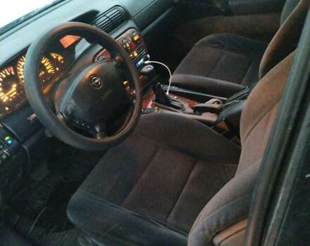 Зелений Опель Омега, об'ємом двигуна 2 л та пробігом 264 тис. км за 3498 $, фото 4 на Automoto.ua