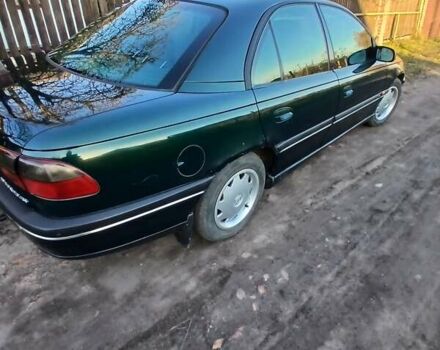 Зелений Опель Омега, об'ємом двигуна 2 л та пробігом 397 тис. км за 1000 $, фото 6 на Automoto.ua