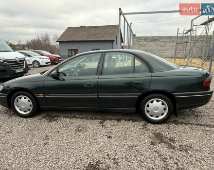 Зелений Опель Омега, об'ємом двигуна 2 л та пробігом 397 тис. км за 2500 $, фото 4 на Automoto.ua