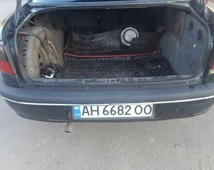Зеленый Опель Омега, объемом двигателя 2 л и пробегом 300 тыс. км за 1800 $, фото 3 на Automoto.ua