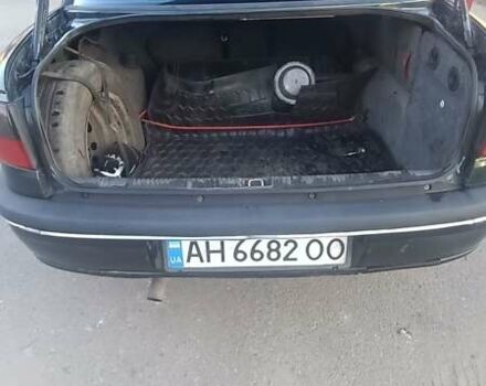 Зеленый Опель Омега, объемом двигателя 2 л и пробегом 293 тыс. км за 1800 $, фото 1 на Automoto.ua