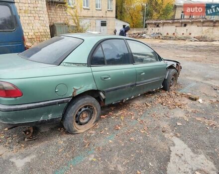 Зеленый Опель Омега, объемом двигателя 1.98 л и пробегом 350 тыс. км за 500 $, фото 1 на Automoto.ua
