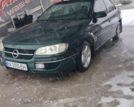 Зеленый Опель Омега, объемом двигателя 2 л и пробегом 418 тыс. км за 1500 $, фото 1 на Automoto.ua