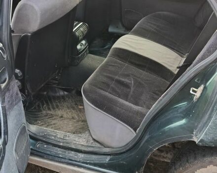 Зеленый Опель Омега, объемом двигателя 2.5 л и пробегом 200 тыс. км за 1600 $, фото 2 на Automoto.ua