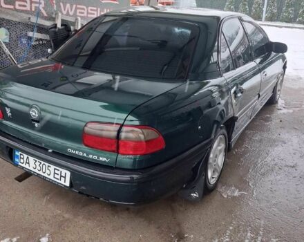 Зеленый Опель Омега, объемом двигателя 2 л и пробегом 418 тыс. км за 1500 $, фото 4 на Automoto.ua