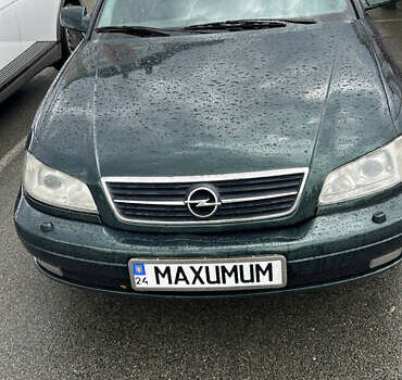 Зеленый Опель Омега, объемом двигателя 2.5 л и пробегом 464 тыс. км за 4300 $, фото 1 на Automoto.ua