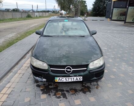 Зеленый Опель Омега, объемом двигателя 2 л и пробегом 300 тыс. км за 617 $, фото 1 на Automoto.ua