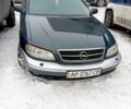 Зеленый Опель Омега, объемом двигателя 2.5 л и пробегом 290 тыс. км за 2000 $, фото 1 на Automoto.ua