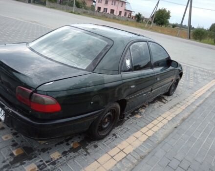 Зеленый Опель Омега, объемом двигателя 2 л и пробегом 300 тыс. км за 617 $, фото 2 на Automoto.ua