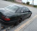 Зеленый Опель Омега, объемом двигателя 2 л и пробегом 300 тыс. км за 617 $, фото 2 на Automoto.ua