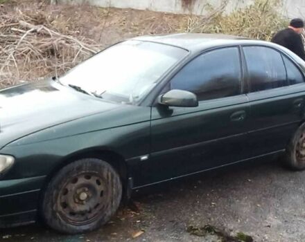 Зеленый Опель Омега, объемом двигателя 2 л и пробегом 350 тыс. км за 1200 $, фото 3 на Automoto.ua