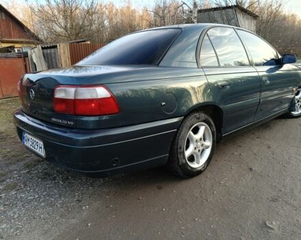 Зеленый Опель Омега, объемом двигателя 2.5 л и пробегом 344 тыс. км за 2250 $, фото 2 на Automoto.ua