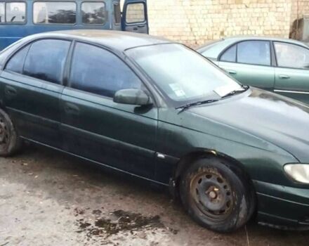 Зеленый Опель Омега, объемом двигателя 2 л и пробегом 350 тыс. км за 1200 $, фото 2 на Automoto.ua