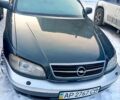 Зеленый Опель Омега, объемом двигателя 2.5 л и пробегом 290 тыс. км за 2000 $, фото 1 на Automoto.ua