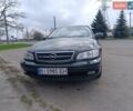 Зеленый Опель Омега, объемом двигателя 2.2 л и пробегом 250 тыс. км за 2500 $, фото 1 на Automoto.ua