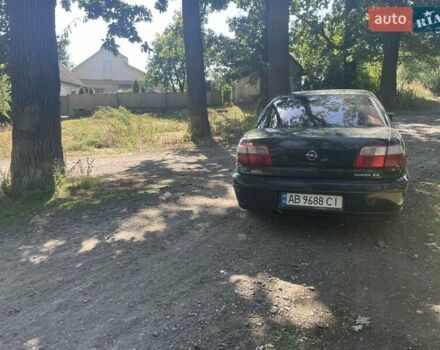 Зелений Опель Омега, об'ємом двигуна 2.2 л та пробігом 380 тис. км за 2800 $, фото 11 на Automoto.ua