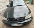 Зеленый Опель Омега, объемом двигателя 2.6 л и пробегом 314 тыс. км за 1000 $, фото 1 на Automoto.ua
