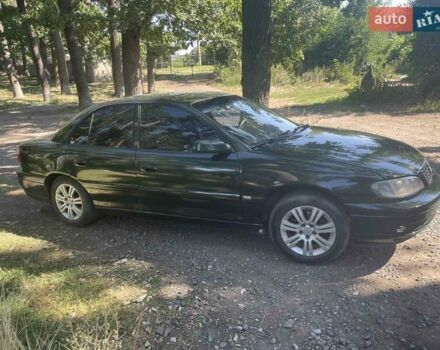 Зелений Опель Омега, об'ємом двигуна 2.2 л та пробігом 380 тис. км за 2800 $, фото 12 на Automoto.ua
