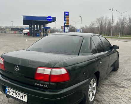 Зеленый Опель Омега, объемом двигателя 2.2 л и пробегом 200 тыс. км за 3000 $, фото 3 на Automoto.ua