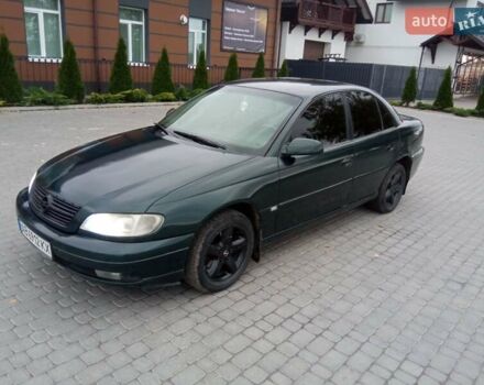 Зеленый Опель Омега, объемом двигателя 2.2 л и пробегом 324 тыс. км за 2500 $, фото 7 на Automoto.ua