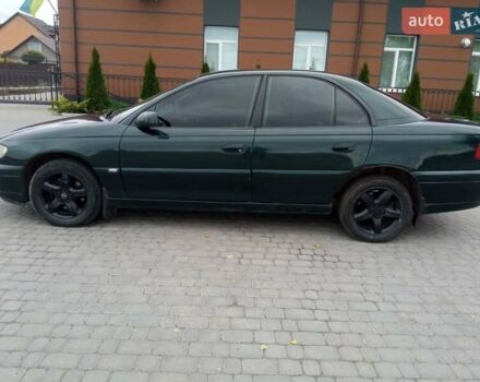 Зеленый Опель Омега, объемом двигателя 2.2 л и пробегом 324 тыс. км за 2500 $, фото 5 на Automoto.ua