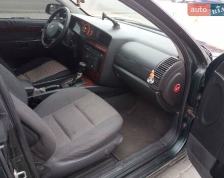 Зеленый Опель Омега, объемом двигателя 2.2 л и пробегом 324 тыс. км за 2500 $, фото 11 на Automoto.ua