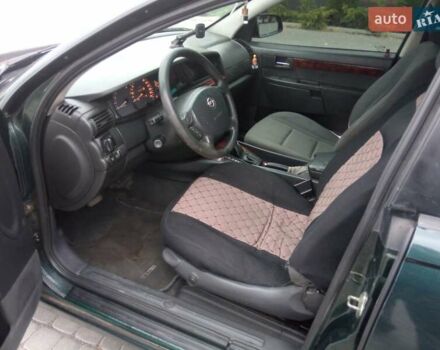 Зеленый Опель Омега, объемом двигателя 2.2 л и пробегом 324 тыс. км за 2500 $, фото 12 на Automoto.ua