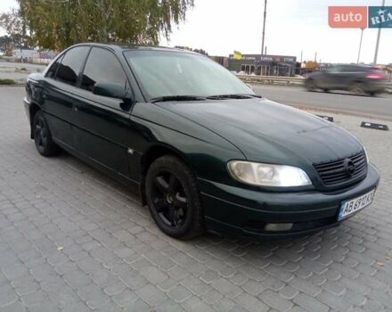 Зеленый Опель Омега, объемом двигателя 2.2 л и пробегом 324 тыс. км за 2500 $, фото 16 на Automoto.ua