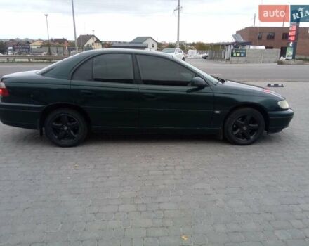 Зеленый Опель Омега, объемом двигателя 2.2 л и пробегом 324 тыс. км за 2500 $, фото 6 на Automoto.ua