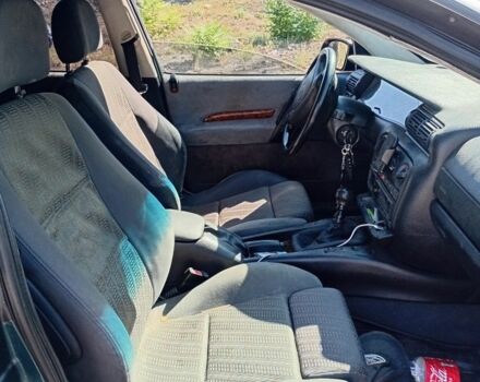 Зеленый Опель Омега, объемом двигателя 2.5 л и пробегом 360 тыс. км за 1400 $, фото 2 на Automoto.ua