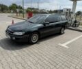 Зеленый Опель Омега, объемом двигателя 2 л и пробегом 230 тыс. км за 3000 $, фото 1 на Automoto.ua