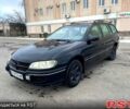 Зеленый Опель Омега, объемом двигателя 2 л и пробегом 200 тыс. км за 2300 $, фото 1 на Automoto.ua